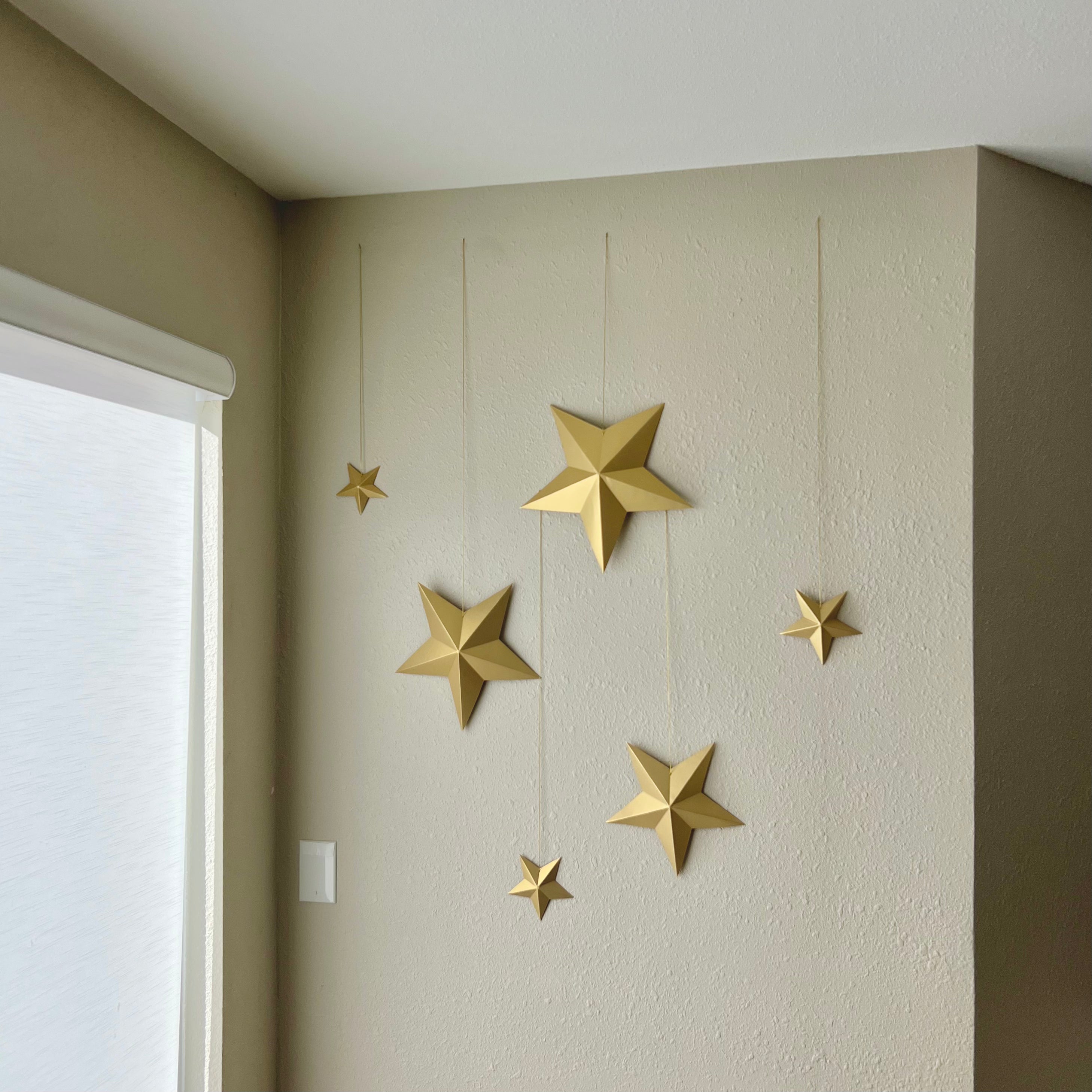 Set de decoración de estrellas doradas en 3D (6 piezas) PartyDeco USA